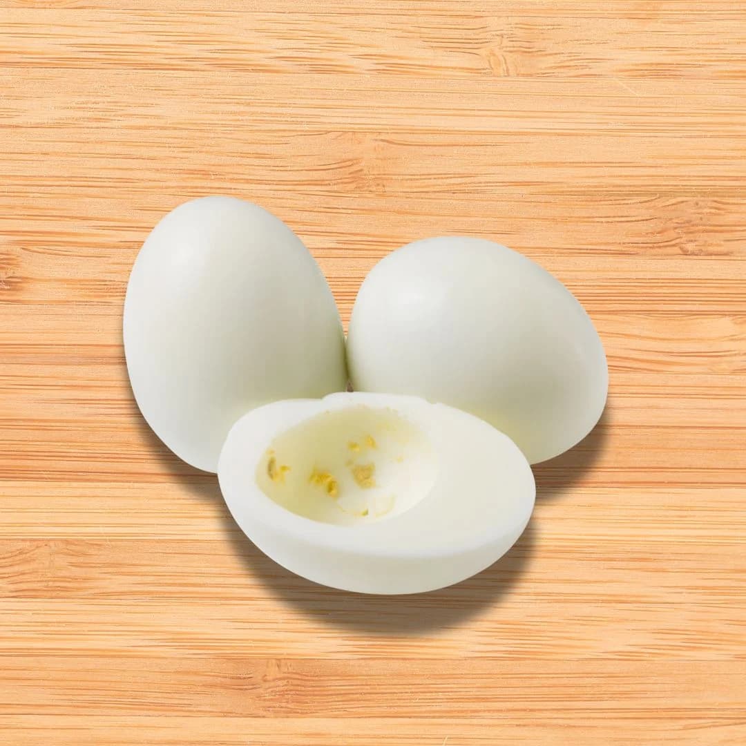 Boiled egg cut in half without yolk