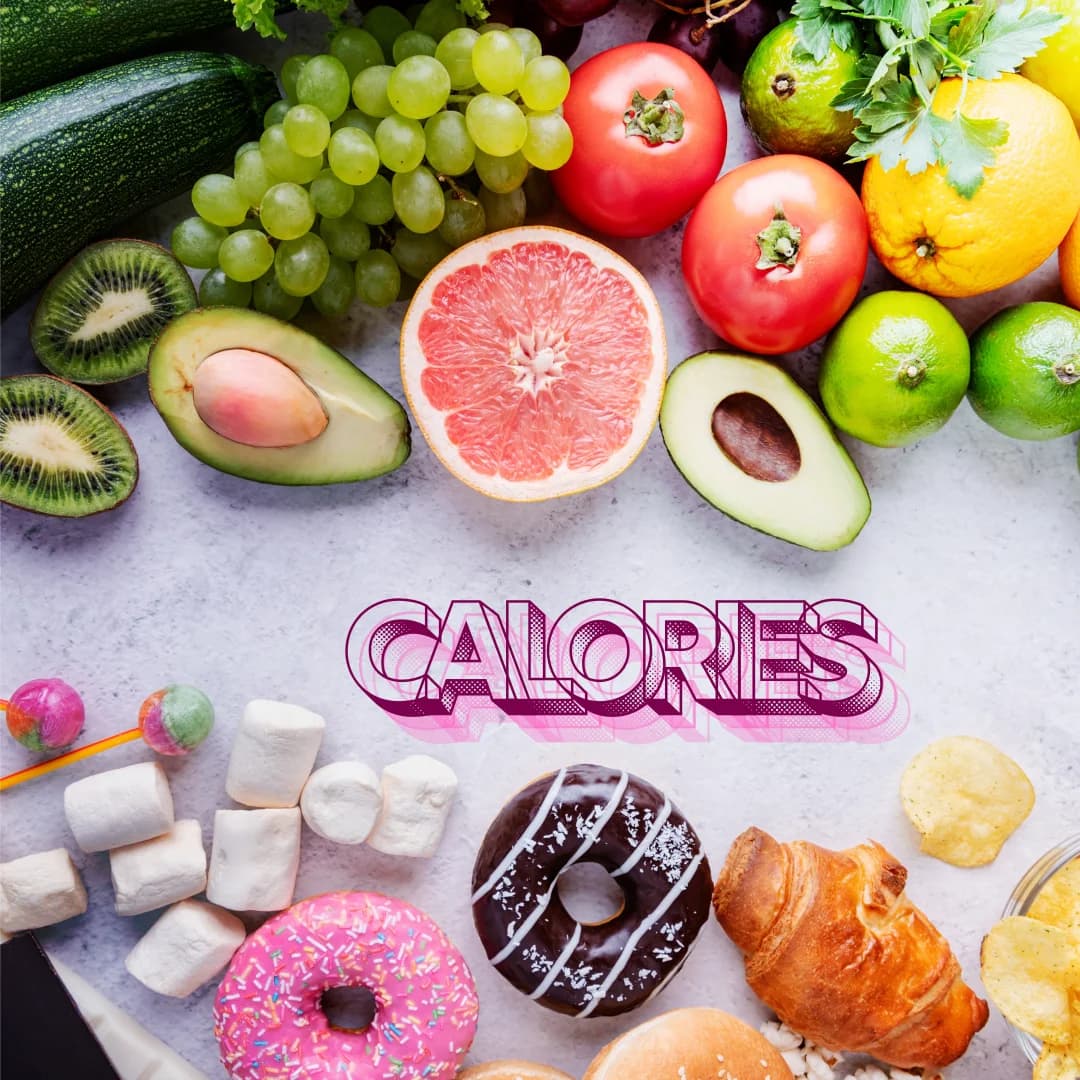 Calorie written on the table and sweets and fruits are placed on the table