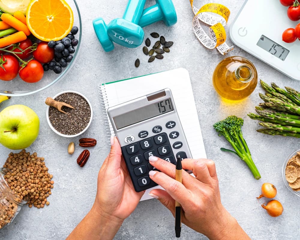 Calculating daily calories with healthy food and nutrition planner