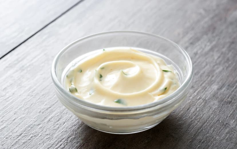 Front view of healthy mayonnaise served in a glass dip bowl