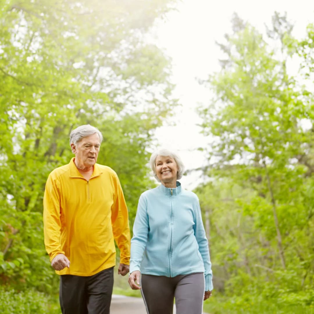 front view of old couple doing morning walk for better health